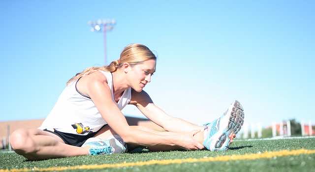 stretching muscles, warming up winter exercise